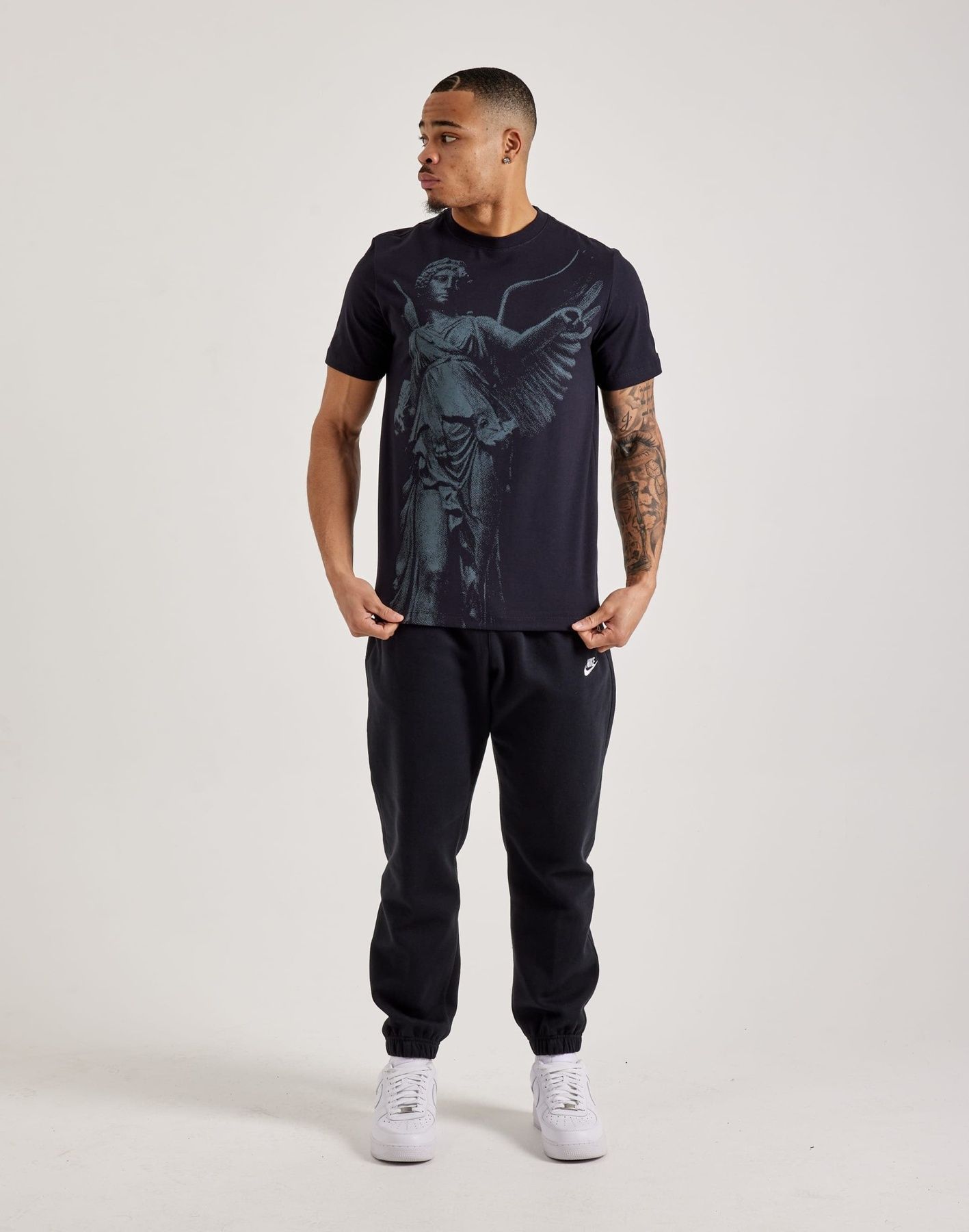 Футболка чоловіча Nike Sportswear Enshrined Graphic T-Shirt IF3364-010 IF3364-010 XS фото